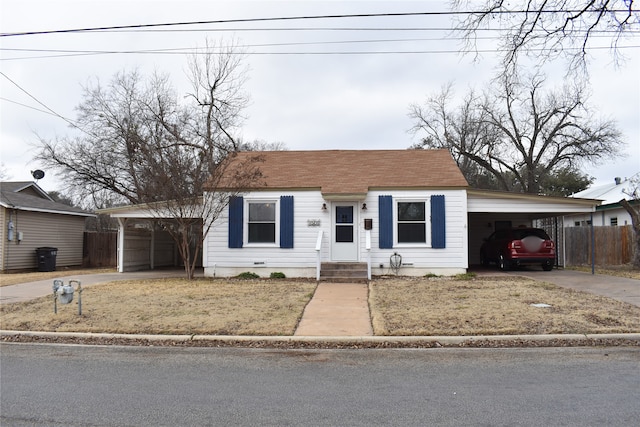 view of front of house with a carport