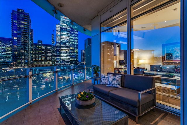 view of balcony at twilight