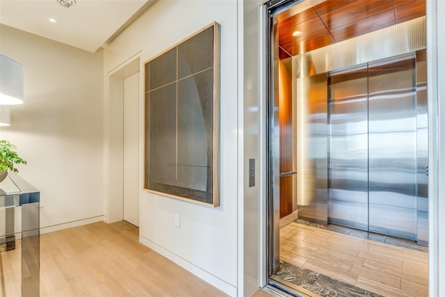 interior space with hardwood / wood-style flooring