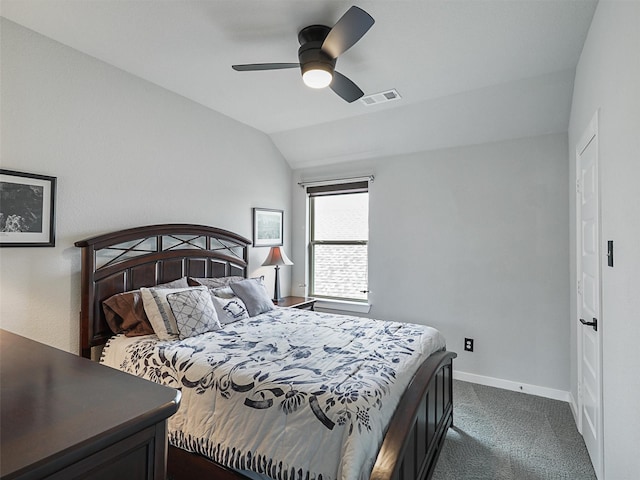 bedroom with a ceiling fan, baseboards, visible vents, lofted ceiling, and dark colored carpet