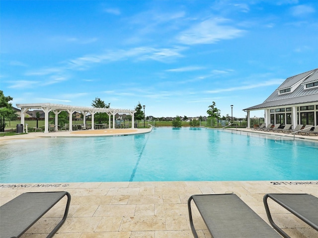 community pool featuring a patio area and a pergola