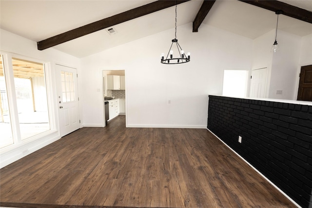 unfurnished dining area featuring vaulted ceiling with beams, a notable chandelier, and dark hardwood / wood-style floors