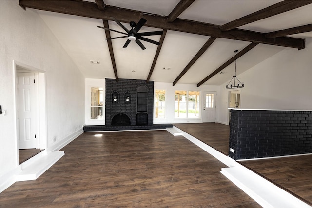 unfurnished living room with a brick fireplace, dark wood-type flooring, high vaulted ceiling, and ceiling fan