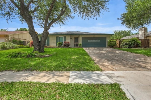 ranch-style house with a garage and a front yard