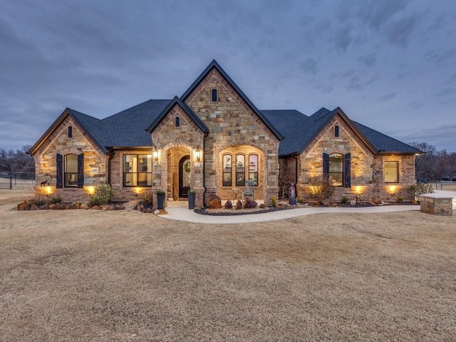 view of front of property with a front lawn