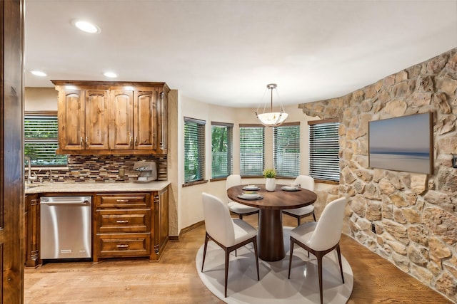 dining room with light wood-type flooring