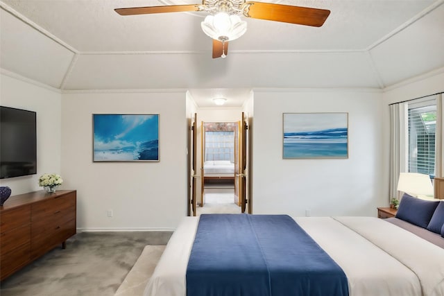 bedroom featuring crown molding, lofted ceiling, light colored carpet, and ceiling fan