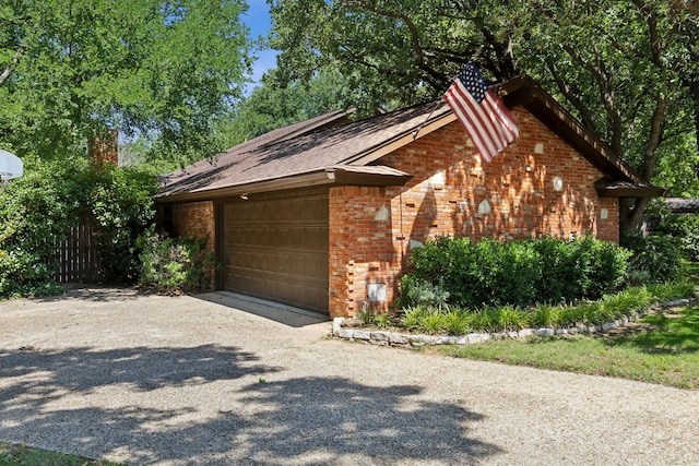 exterior space featuring a garage