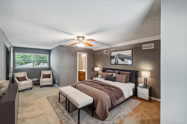 bedroom featuring ceiling fan and light carpet