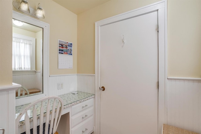 interior space featuring wainscoting