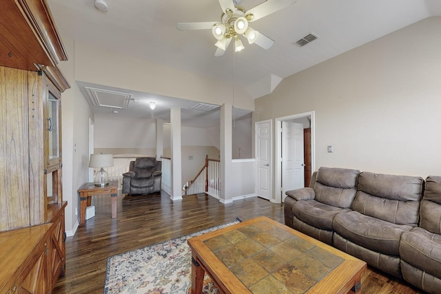 living room with ceiling fan, lofted ceiling, and dark hardwood / wood-style flooring