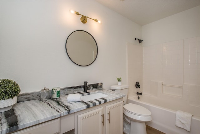 full bathroom featuring vanity, shower / washtub combination, and toilet