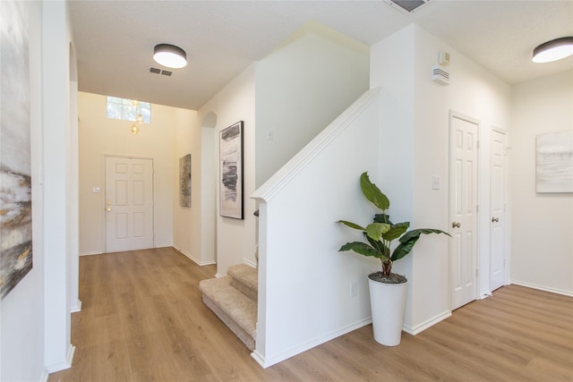 hallway featuring light hardwood / wood-style flooring