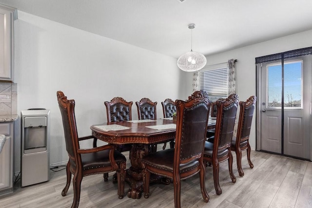 dining space featuring light hardwood / wood-style floors