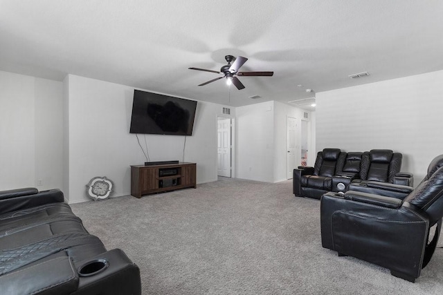 living room featuring light carpet and ceiling fan