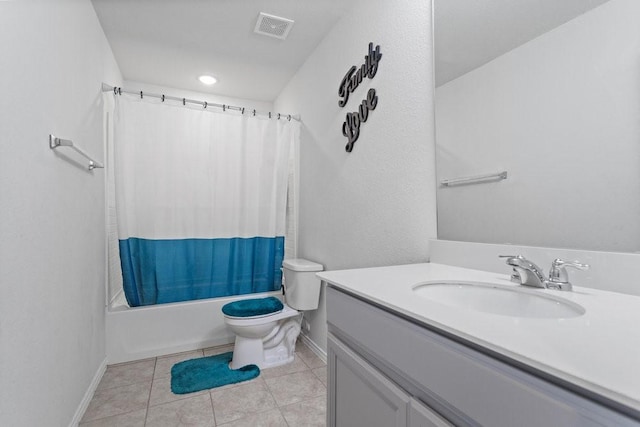 full bathroom with shower / tub combo with curtain, vanity, toilet, and tile patterned flooring