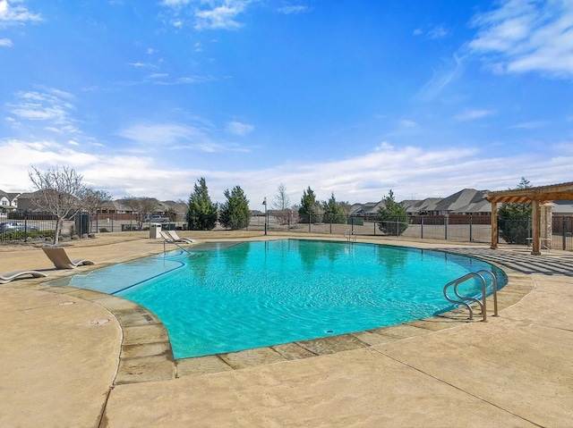 view of pool with a pergola and a patio area