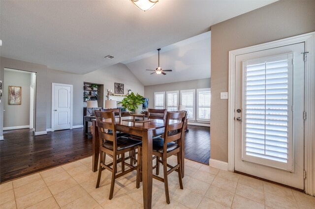 dining area with ornamental molding and dark hardwood / wood-style flooring