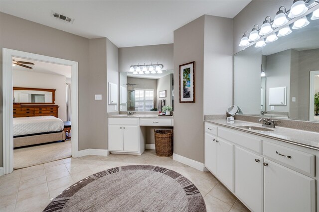 hallway with lofted ceiling, sink, and light carpet