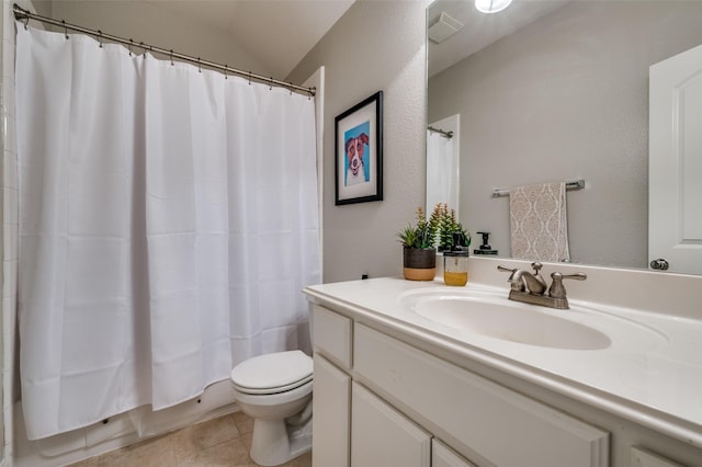 full bath with visible vents, toilet, lofted ceiling, tile patterned floors, and vanity