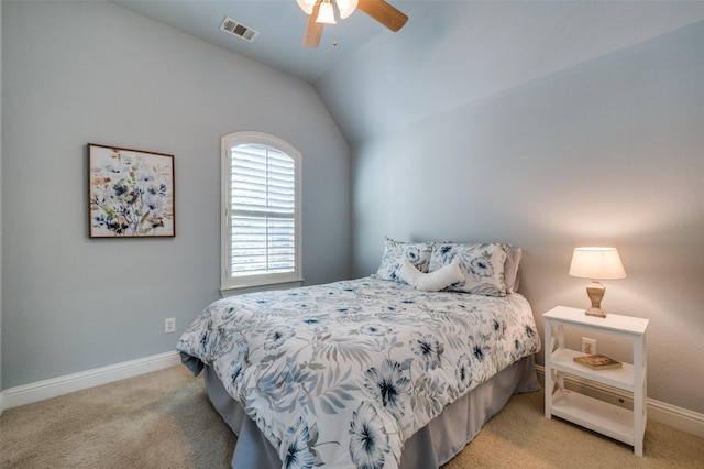 bedroom featuring vaulted ceiling, carpet flooring, visible vents, and baseboards