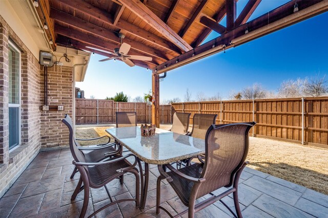 back of property featuring a patio area and solar panels