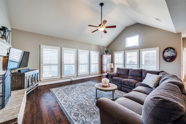 living room with a fireplace, high vaulted ceiling, dark hardwood / wood-style floors, and ceiling fan