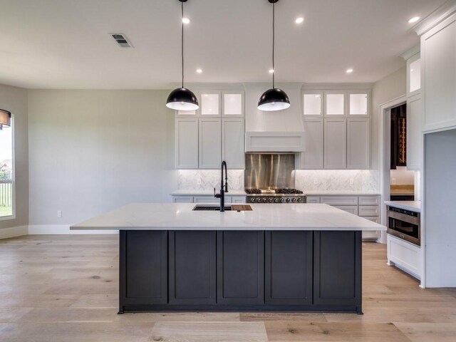 1165 Stonebridge Pass, Gunter, TX 75058 - kitchen with a sink, tasteful backsplash, white cabinetry, and recessed lighting