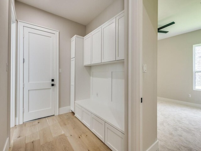 1165 Stonebridge Pass, Gunter, TX 75058 - mudroom featuring baseboards and light wood-type flooring