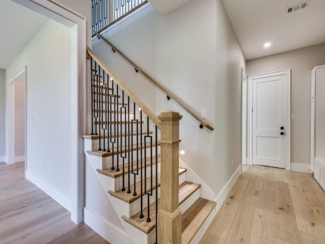 1165 Stonebridge Pass, Gunter, TX 75058 - stairway with wood finished floors, baseboards, and recessed lighting