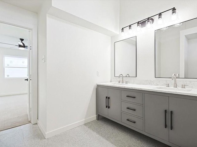 bathroom featuring vanity and ceiling fan