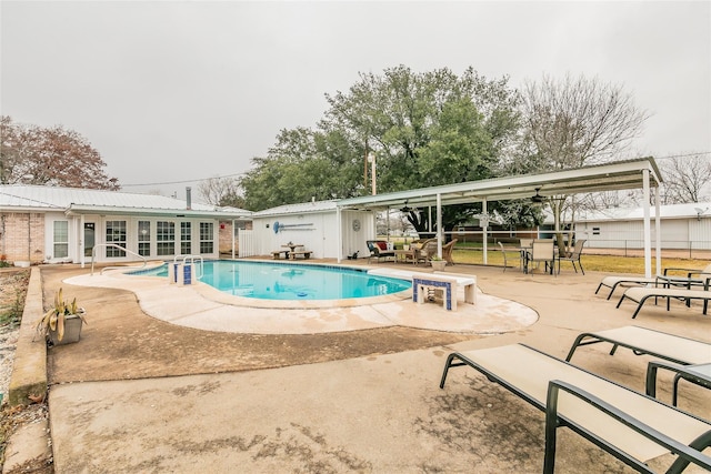 view of swimming pool featuring a patio