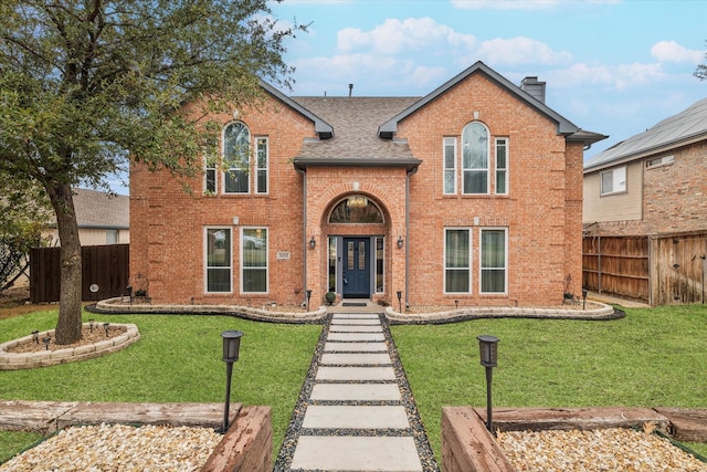 view of front facade with a front yard