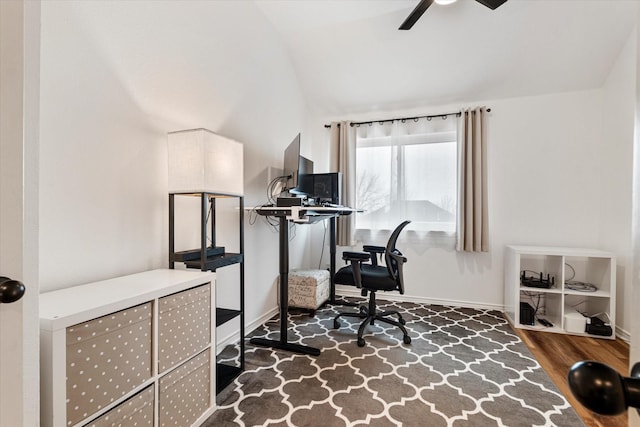 office space with lofted ceiling and dark hardwood / wood-style flooring