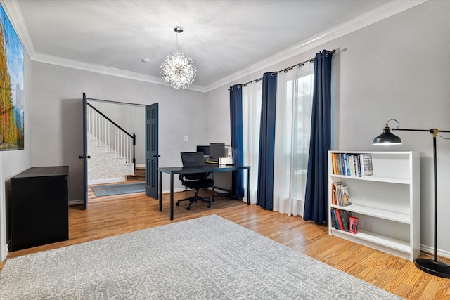 office space with crown molding, an inviting chandelier, and hardwood / wood-style floors