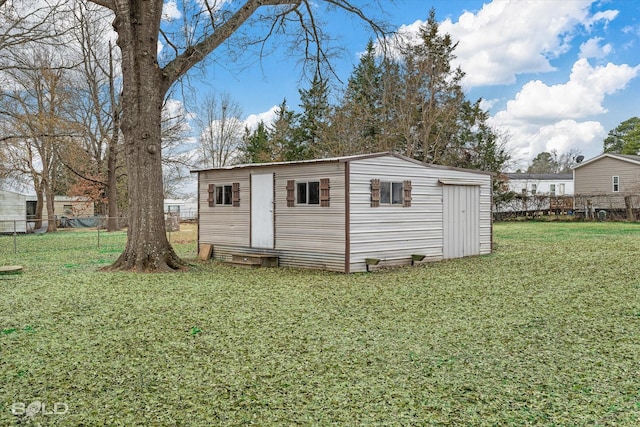 view of outdoor structure with a yard