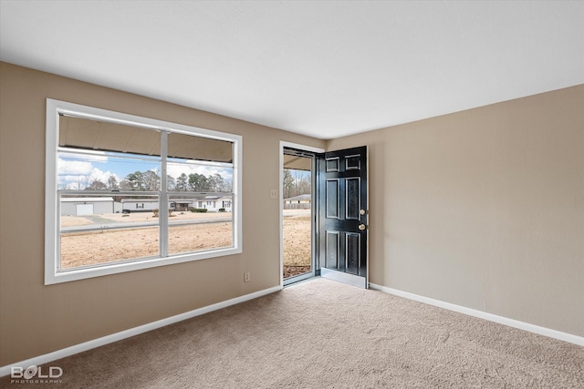 view of carpeted spare room