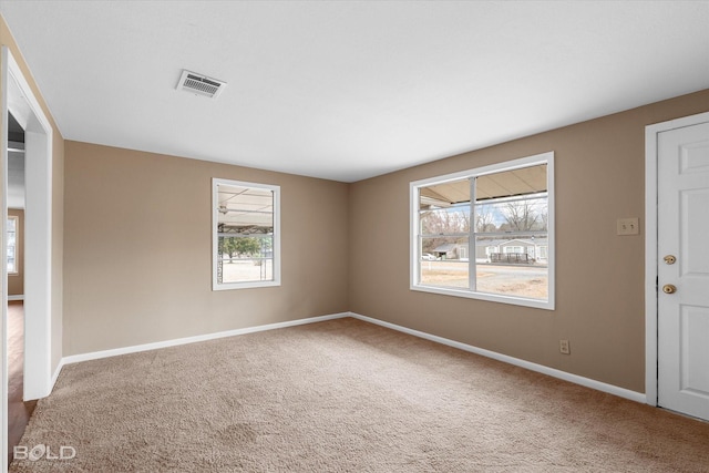 view of carpeted spare room