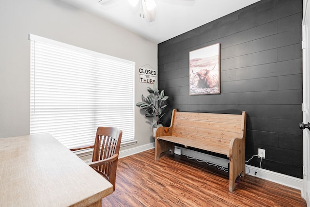 office with hardwood / wood-style flooring and ceiling fan