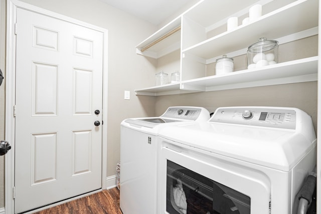 laundry room featuring dark hardwood / wood-style floors and separate washer and dryer