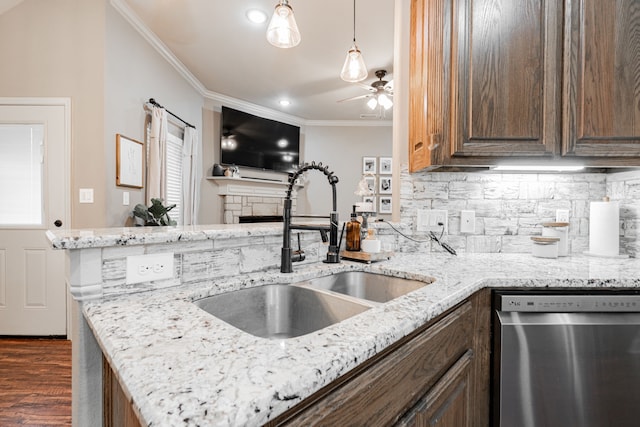 kitchen featuring sink, backsplash, stainless steel dishwasher, kitchen peninsula, and crown molding