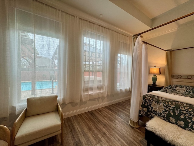 bedroom with hardwood / wood-style flooring