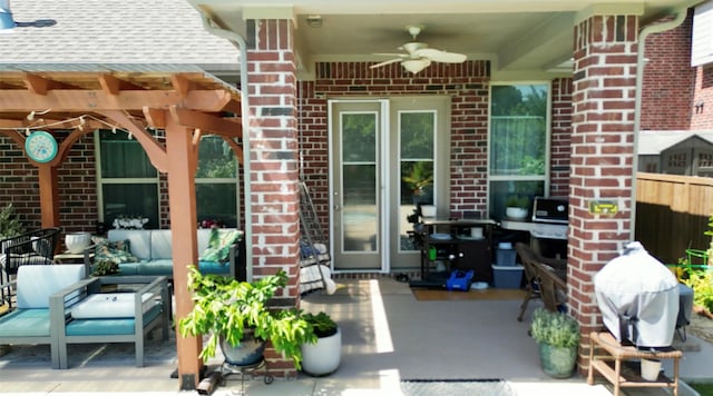 view of patio / terrace featuring an outdoor living space, grilling area, and ceiling fan