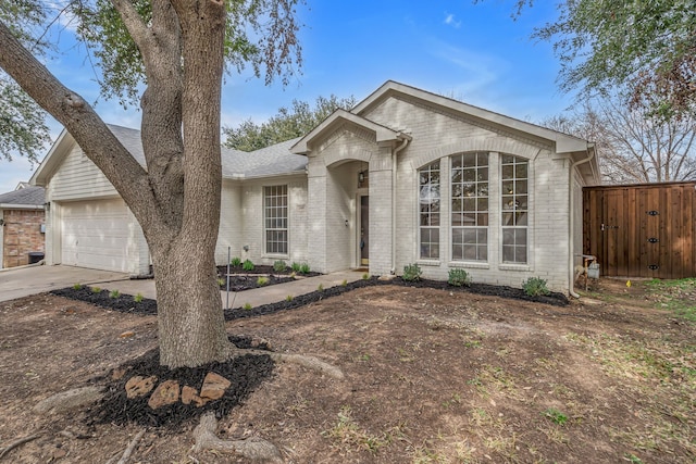 single story home featuring a garage