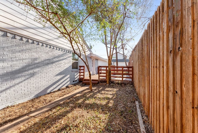 view of yard with a deck