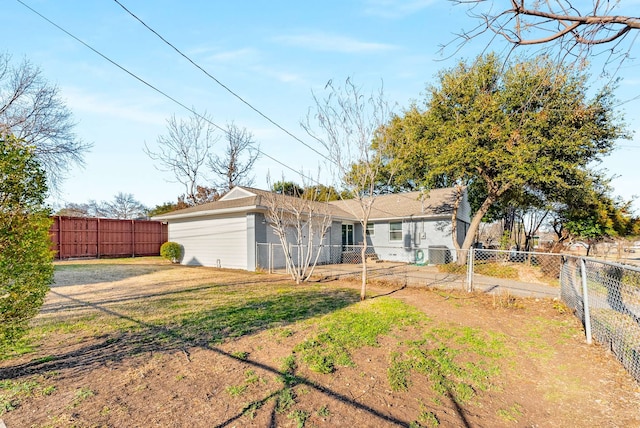 rear view of property with a yard