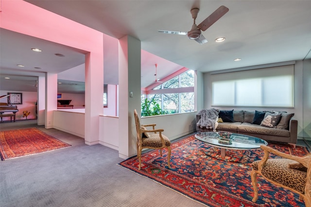 living room with light carpet and ceiling fan