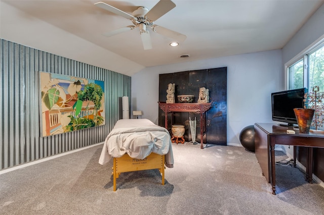 carpeted bedroom with lofted ceiling and ceiling fan