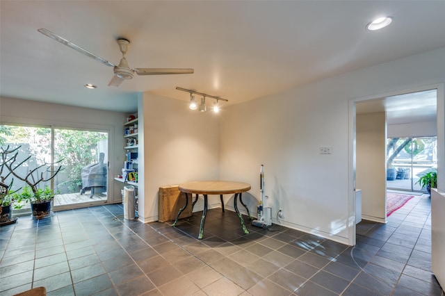 misc room featuring a wealth of natural light, ceiling fan, and track lighting