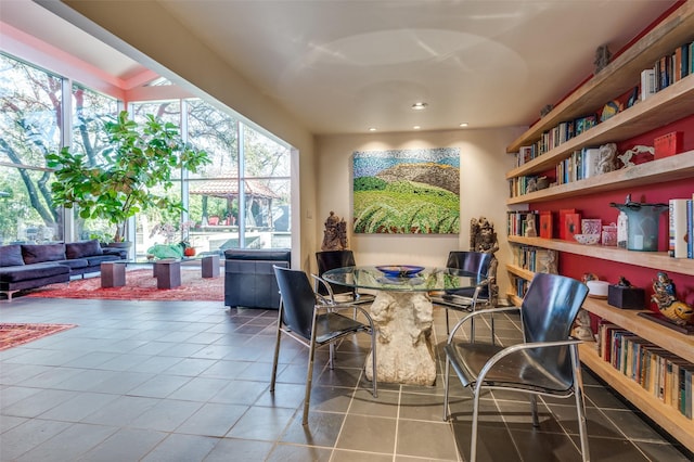 living area featuring tile patterned flooring